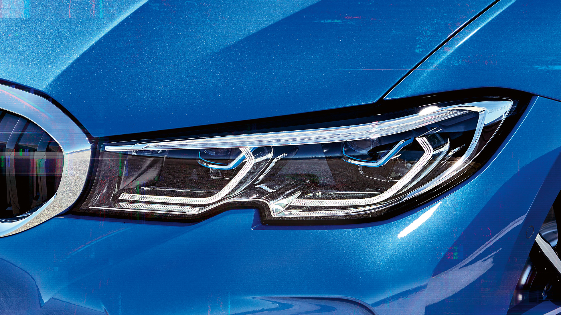 BMW řady 3 Sedan, BMW Laserlight Detailní boční pohed na pravý přední světlomet BMW Laserlight.