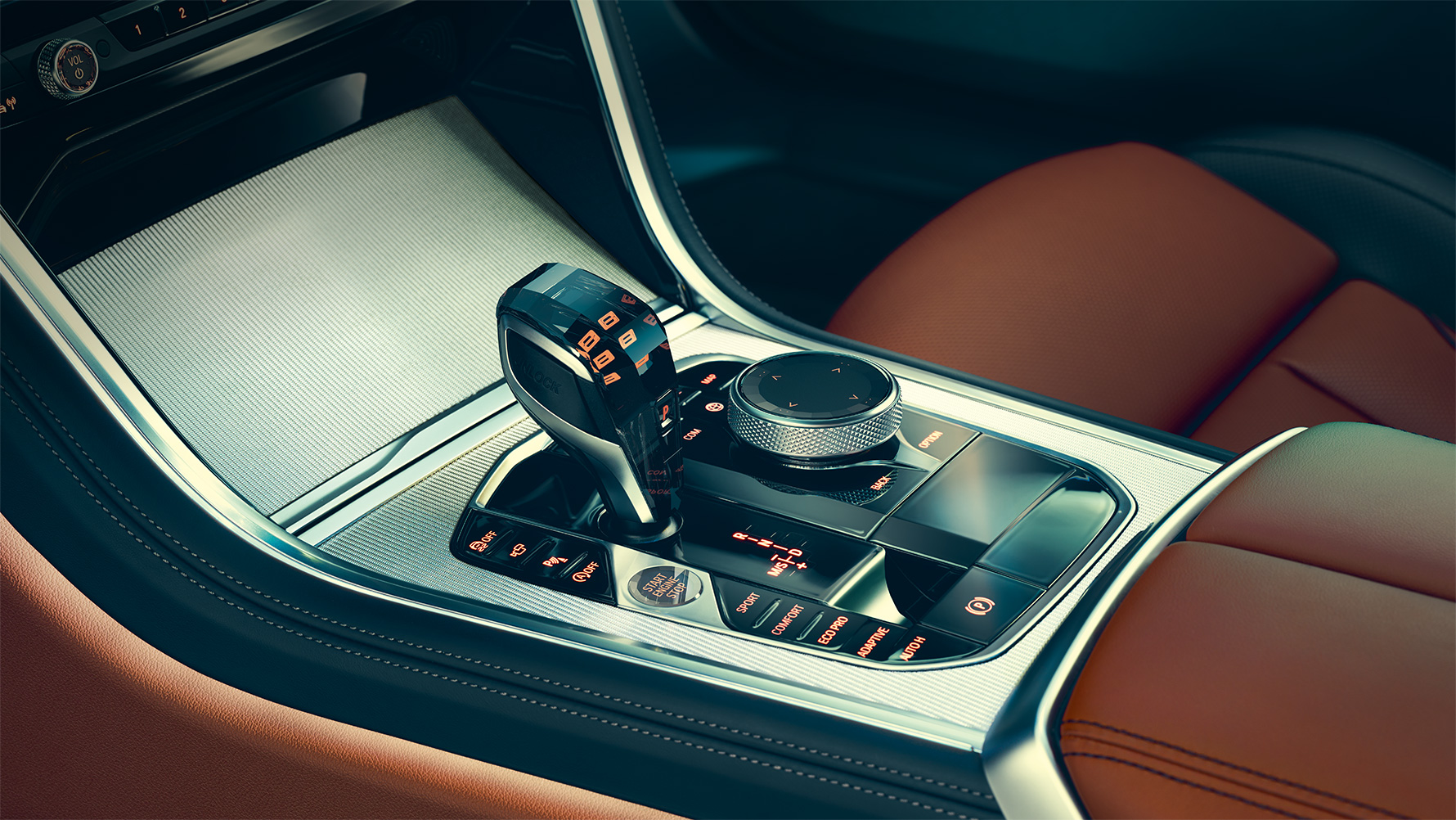BMW řady 8 Coupé, středová konzola Detail na interiér BMW řady 8 Coupé se zaměřením na středovou konzolu.