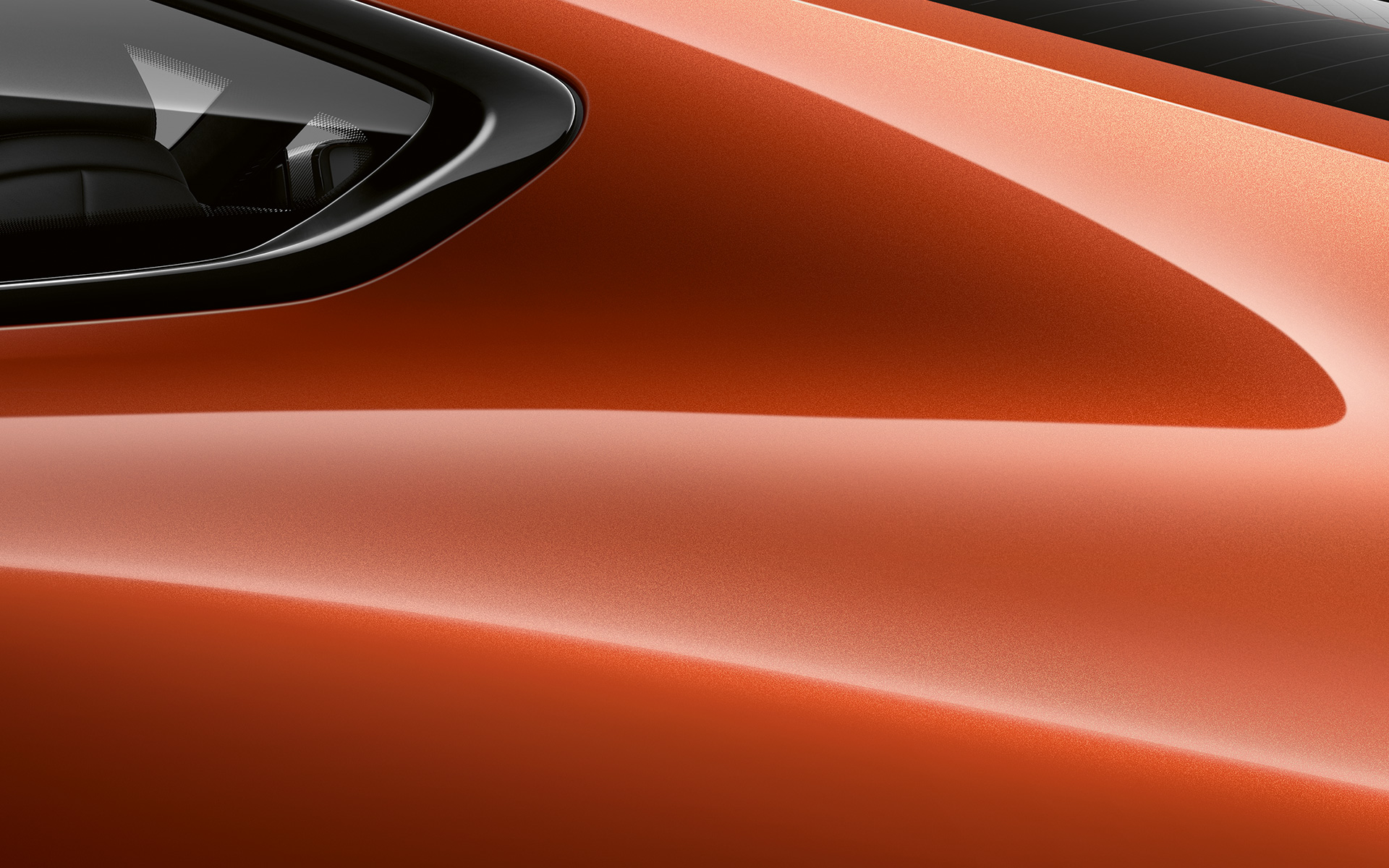 BMW řady 8 Coupé, detail na C-sloupek Detail na C-sloupek BMW řady 8 Coupé v metalické barvě Sunset Orange.