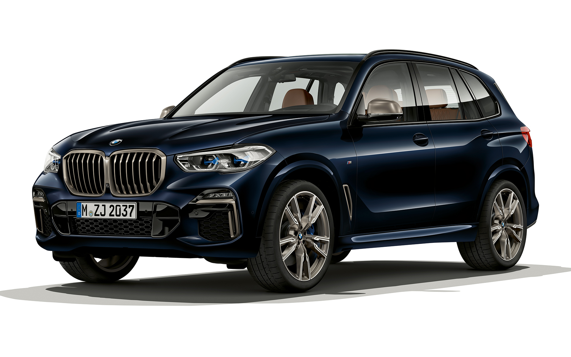 Přední část BMW X5 M50d Noční záběr přední části BMW X5 M50d