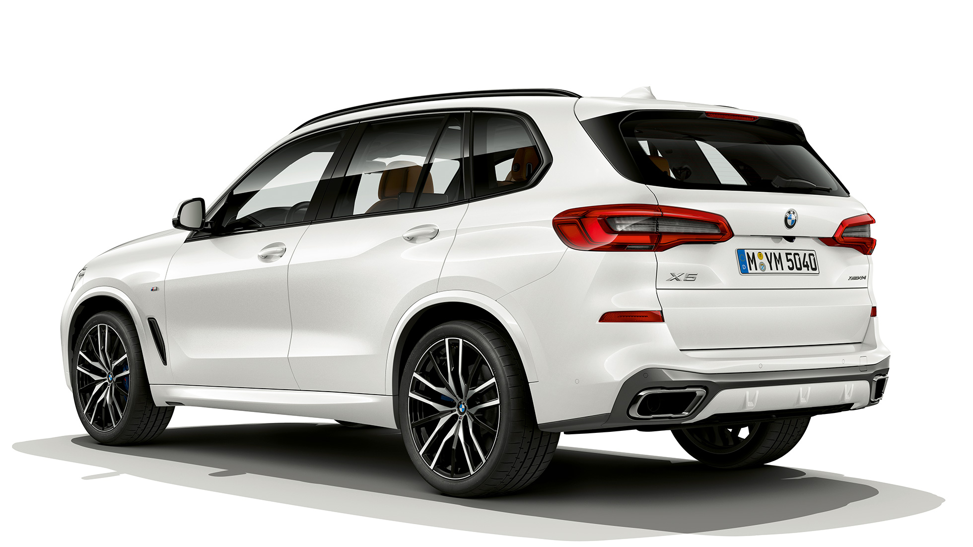 M sportovní paket BMW X5 xDrive40i ze tříčtvrtečního pohledu zezadu M sportovní paket BMW X5 xDrive40i G05 2018 v metalické barvě Phytonic Blue (modrá) ze tříčtvrtečního pohledu zezadu