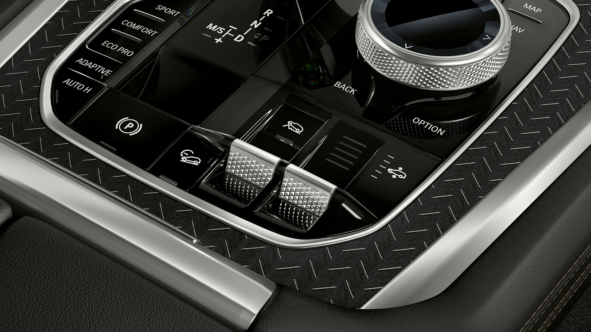 Středový panel BMW X6. Detailní pohled na interiér BMW X6 se záběrem na středový panel.